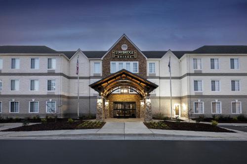 a rendering of a hotel with the front entrance at Staybridge Suites Raleigh-Durham Airport-Morrisville by IHG in Morrisville