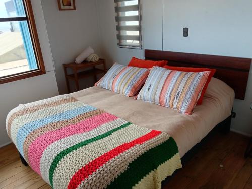 Katil atau katil-katil dalam bilik di Pichilemuhostel SurfersView