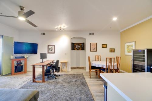a living room with a table and a dining room at Red Rox Phoenix Condo with Patio about 3 Mi to Airport in Phoenix