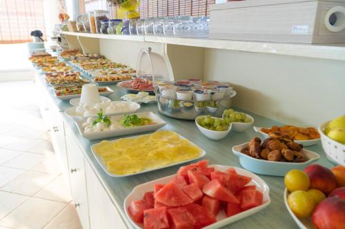a buffet line with many different types of food at Masseria Un Posto al Sole in Otranto