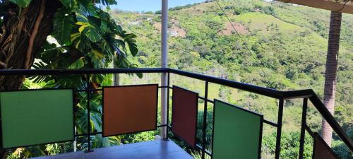 a balcony with a view of a mountain at Finca Familiar Talena in Sopetran