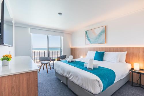 Postel nebo postele na pokoji v ubytování Scamander Beach Resort