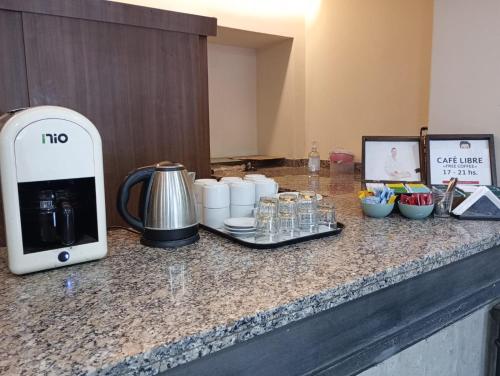 Příslušenství pro přípravu čaje a kávy v ubytování Hotel San Martín