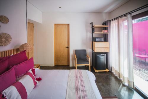 Ένα ή περισσότερα κρεβάτια σε δωμάτιο στο Casa Rosamate