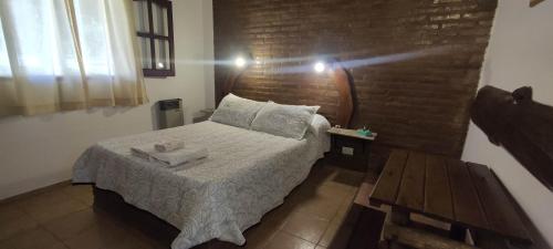 Postel nebo postele na pokoji v ubytování Cabañas La Morada