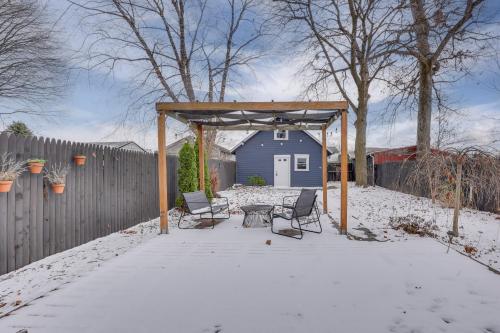 a backyard with two chairs and a gazebo in the snow at Patio and Lake Views Family-Friendly Canton Retreat in Canton