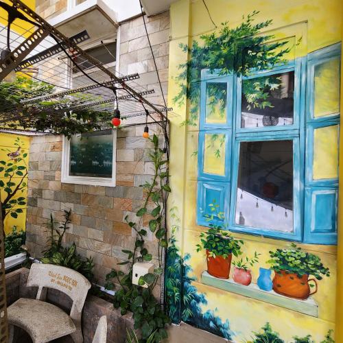 Κήπος έξω από το Ngoc Son Hotel