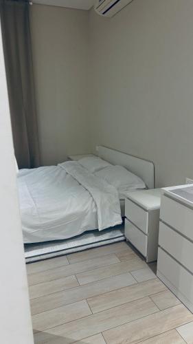 Postel nebo postele na pokoji v ubytování هوانا صلاله