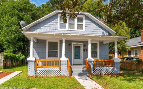 a small house with two benches in front of it at Riverside Craftsman with 3 beds and 3 baths, Pet friendly, Great neighborhood in Jacksonville