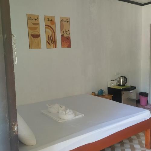 Ένα ή περισσότερα κρεβάτια σε δωμάτιο στο Noah Xye Guest House