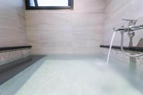 Fotografie z fotogalerie ubytování Green Hot Spring Hotel v destinaci Ťiao-si