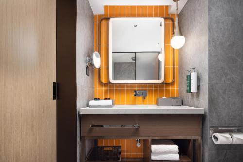 Koupelna v ubytování Home2 Suite by Hilton Harbin Central Street