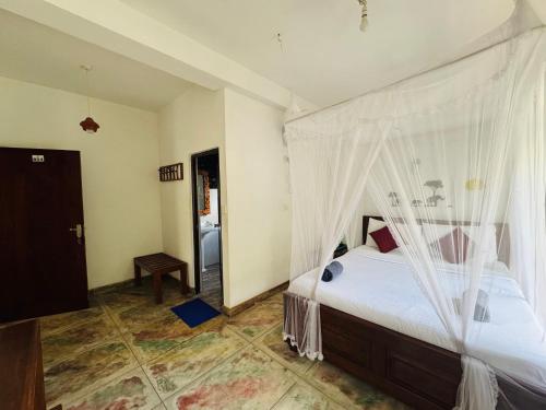 Ένα ή περισσότερα κρεβάτια σε δωμάτιο στο River Splendour Home Stay