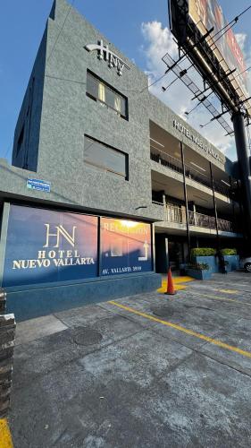 an empty parking lot in front of a building at Hotel Nuevo Vallarta in Guadalajara