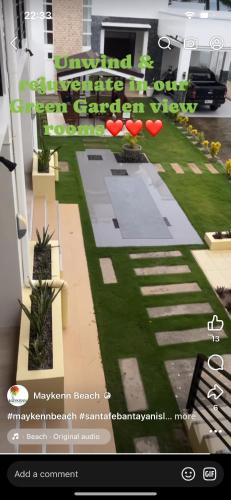 a screenshot of a website for a house with a garden at Maykenn Beach in Bantayan Island