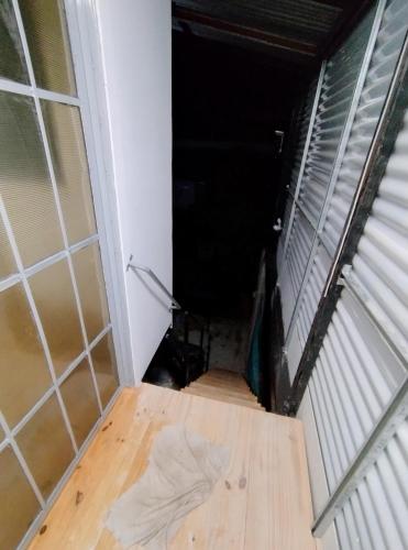 a room with a hallway with a floor and a door at Departamento 3 - 1er piso Centro Pileta in Formosa