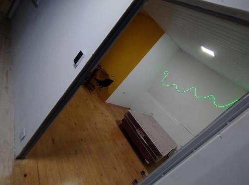 an overhead view of a room with a table and a stairs at Departamento 3 - 1er piso Centro Pileta in Formosa