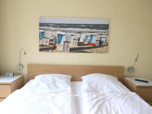 Una cama o camas en una habitación de Brandenburger Straße 5b, Whg.7