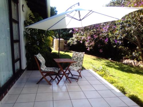 Κήπος έξω από το Manaba Holiday Home