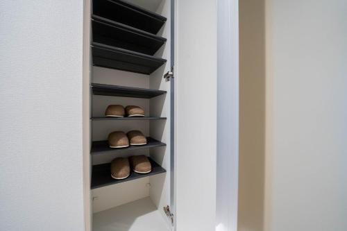 a walk in closet with breads in it at Altiplano in Sapporo