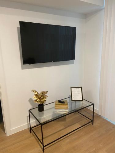 TV a/nebo společenská místnost v ubytování Anu Rentals