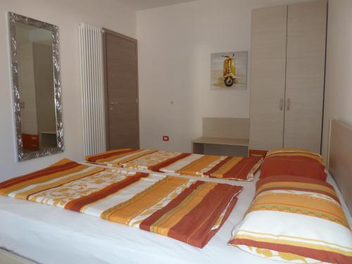 Ένα ή περισσότερα κρεβάτια σε δωμάτιο στο Casa Gemma