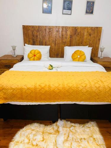 Katil atau katil-katil dalam bilik di Vuyomat Guest House 1