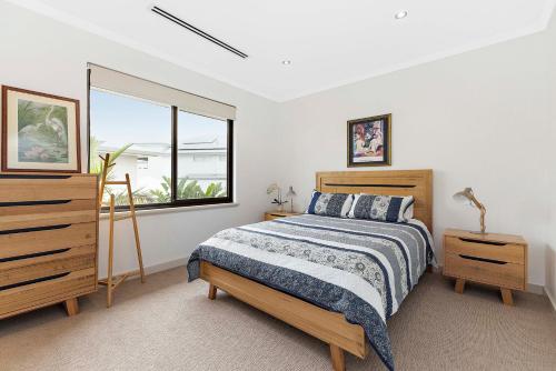 Postel nebo postele na pokoji v ubytování Coogee Beach Oasis