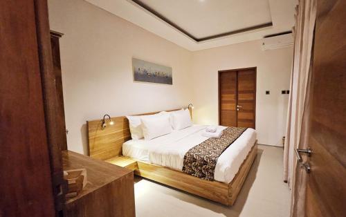 Ένα ή περισσότερα κρεβάτια σε δωμάτιο στο Villa Niceline