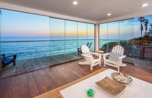 a living room with a view of the ocean at Ocean Dreamin in Encinitas