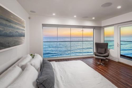 a living room with a couch and a chair at Ocean Dreamin in Encinitas