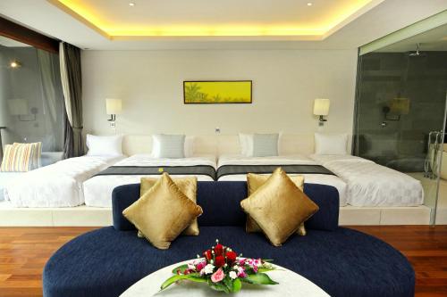 Katil atau katil-katil dalam bilik di Watermark Hotel & Spa Bali