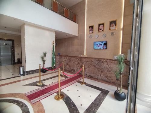 Μια τηλεόραση ή/και κέντρο ψυχαγωγίας στο Al Kiram Hotel Al Azizia