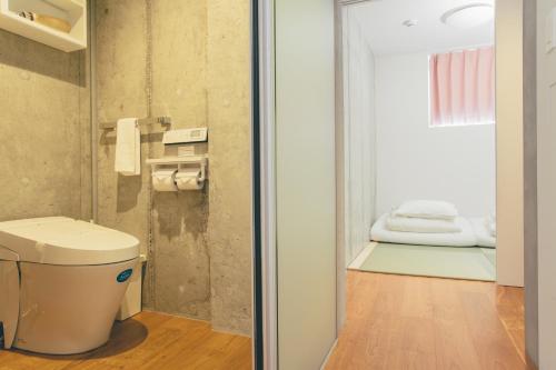 Koupelna v ubytování DOMO Hotel