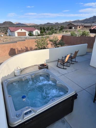 a hot tub sitting on top of a roof at The Joshua Tree House in Joshua Tree