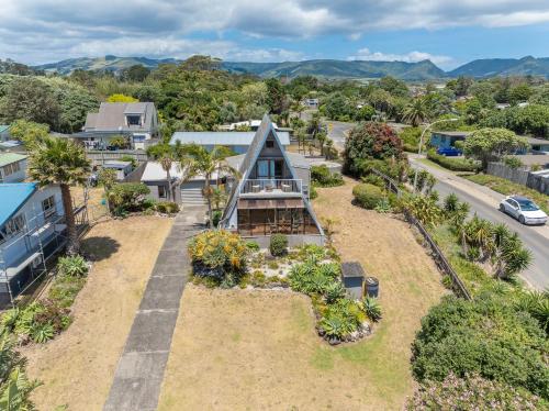 an aerial view of a house with a garden at Ahiparadise - Ahipara Holiday Home in Ahipara