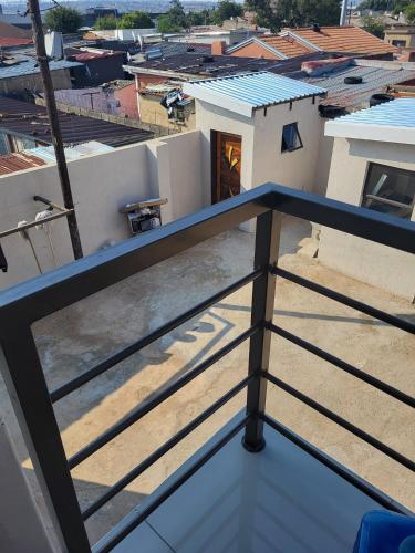 a view from the balcony of a house at Park Q Residence in Pimville
