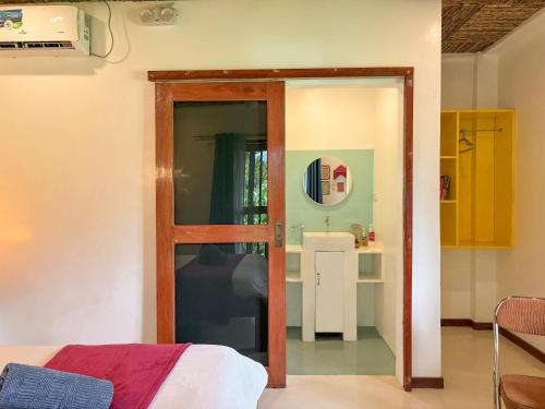 Kuchyň nebo kuchyňský kout v ubytování Copacabana Siargao