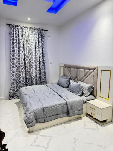 Ένα ή περισσότερα κρεβάτια σε δωμάτιο στο Sunny Service Apartment