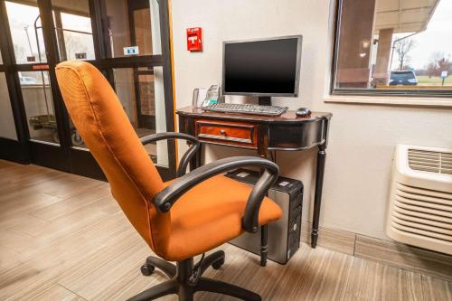 an office with a desk with a computer and a chair at Quality Inn & Suites Danville East in Danville