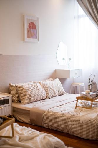 a bedroom with a bed in a room at Bungalow Putrajaya 15pax w Private Pool Gathering in Putrajaya