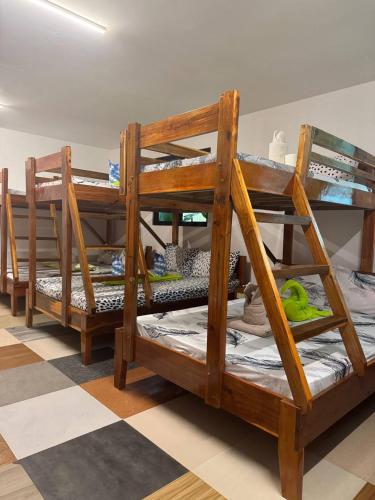 Postel nebo postele na pokoji v ubytování Aquaholik Bunk Bed
