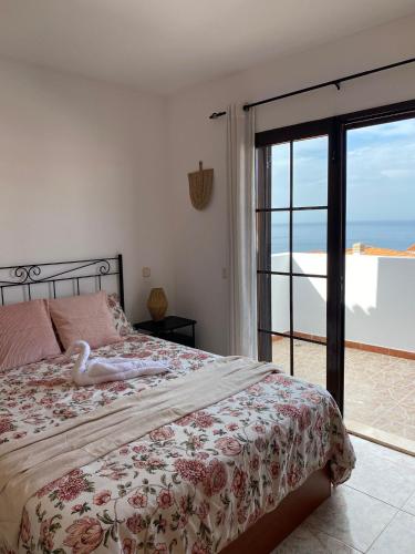 Postel nebo postele na pokoji v ubytování Vivienda con vistas al mar, cerca de la playa y 3 bedrooms
