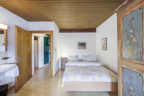 Cama o camas de una habitación en Chasa Moffa