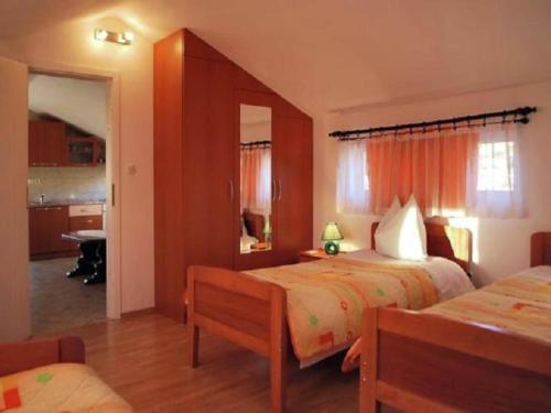 Ένα ή περισσότερα κρεβάτια σε δωμάτιο στο Apartment in Croatia near Adriatic Coast