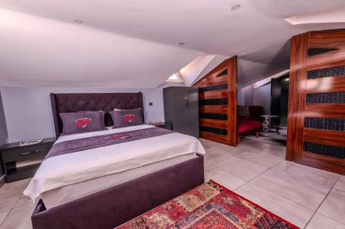 a bedroom with a large bed in a room at Ruby Hotel in Istanbul