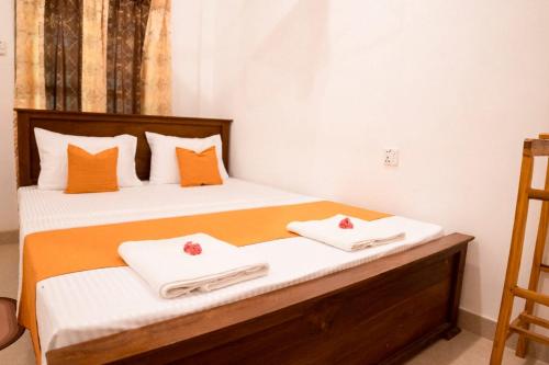 Postel nebo postele na pokoji v ubytování Kudawewa Eco Resort