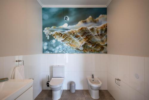 Ένα μπάνιο στο Ocean's Edge Holiday Villa