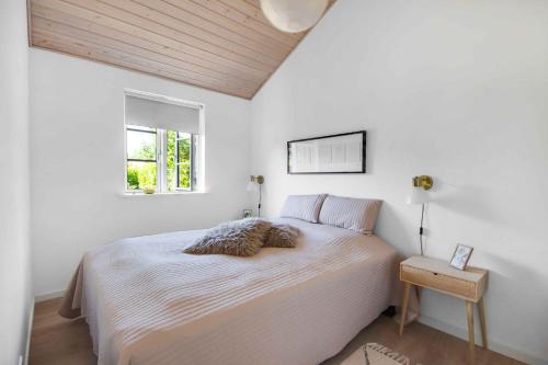 Ένα ή περισσότερα κρεβάτια σε δωμάτιο στο New Modern Holiday Home Near The Beach And City