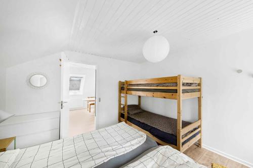 Postel nebo postele na pokoji v ubytování Holiday Apartment On Bornholm With Sea View